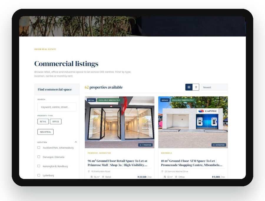 Orion Real Estate listings on a tablet